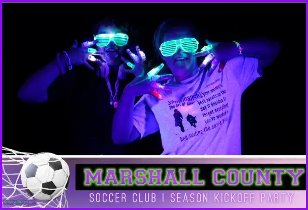 Guests glowing under UV blacklight photo booth