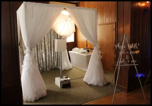Photo booth upgrades including prints and scrapbook