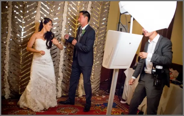 Wedding guests signing personalized scrapbook